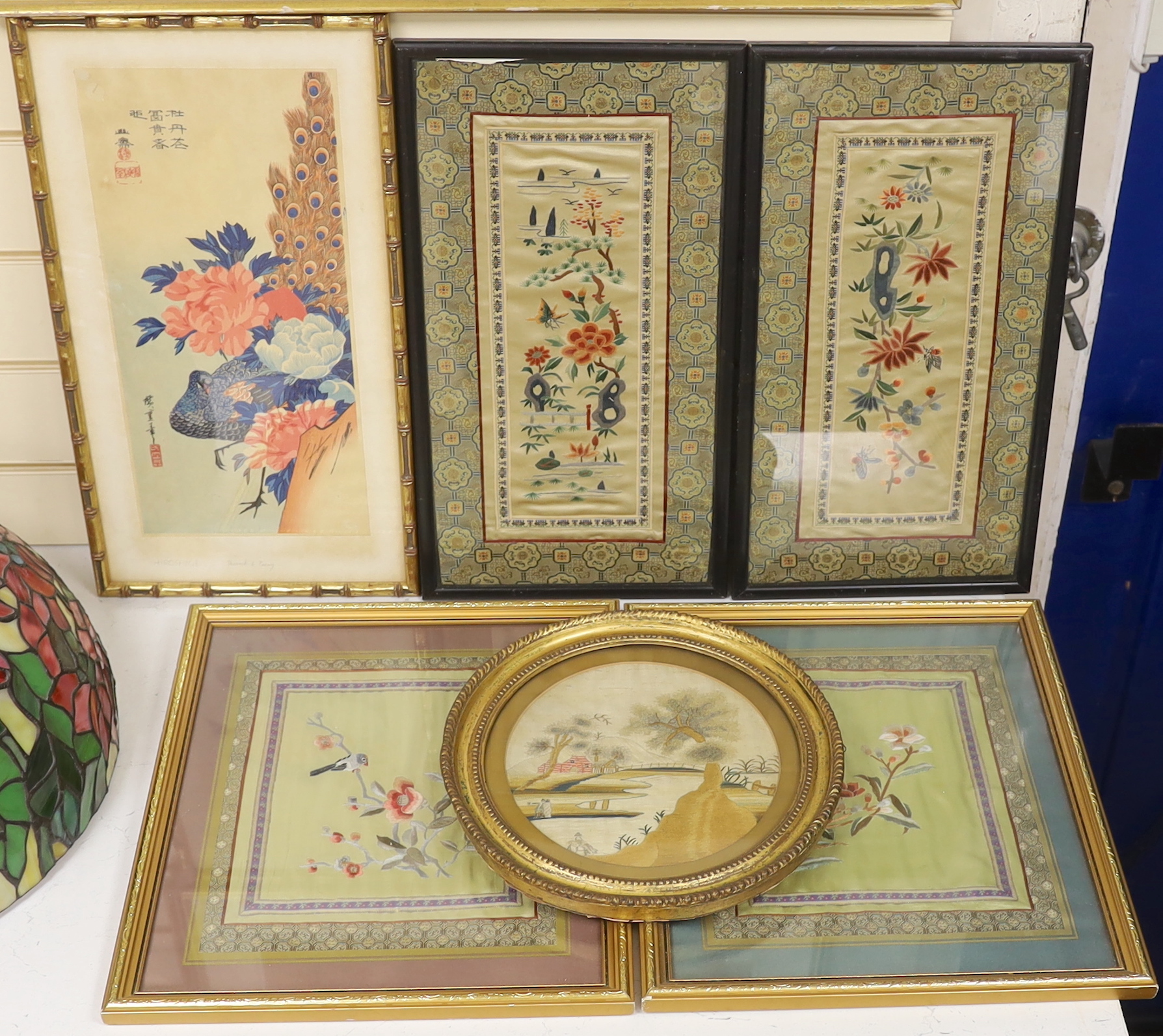 Two pairs of framed 20th century Chinese silk embroideries, two using Chinese knotting, a Hiroshima ‘Peacock and Peony’ print and a circular, figural landscape embroidery (6)